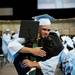 A Skyline graduate hugs a faculty member during commencement on Monday, June 10. Daniel Brenner I AnnArbor.com